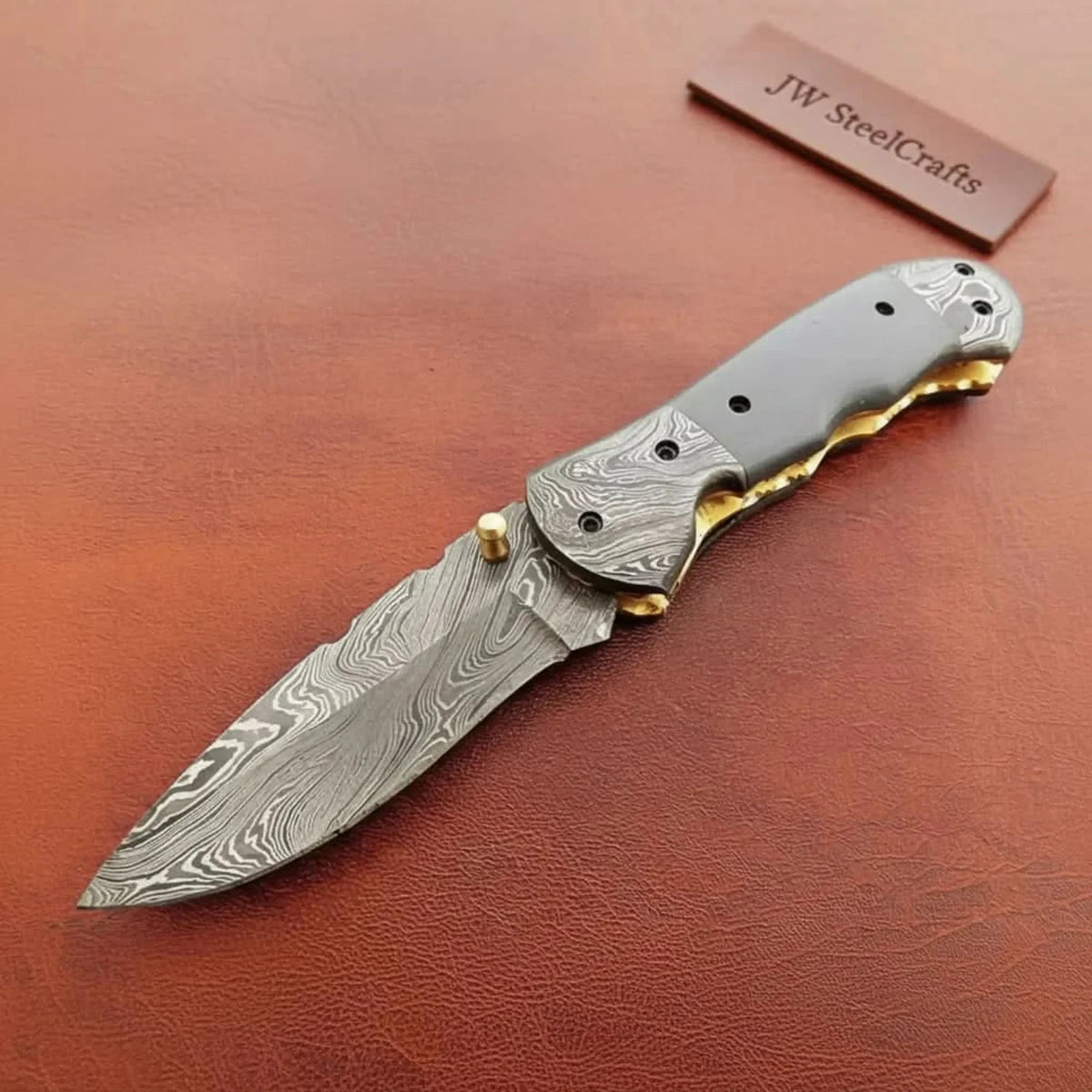 Damascus Black Horn Ridge Pocket Knife with Brass Bolster Accent