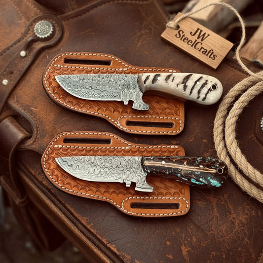 2 Piece Damascus Tracker Knife Set with Ram Horn and Pinecone Resin Handles
