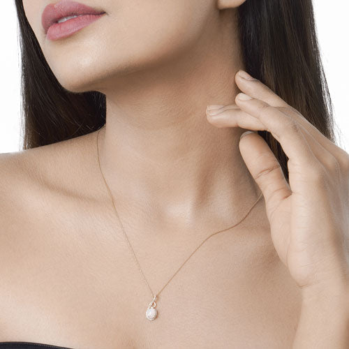 0.56 Carat Genuine Ethiopian Opal and White Diamond 14K Yellow Gold Pendant